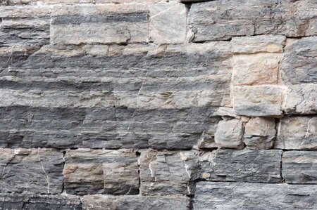 Italian ancient house: typical stone wallの写真素材
