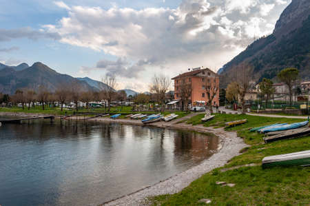Anfo on Lake Idro, a beautiful town with a tourist and fishing port, a tourist destination for holidays by the lake, at the foot of the Alps immersed in unspoilt nature.のeditorial素材