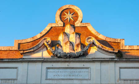 Rome Italy. Internal facade of "Porta del Popolo", in the square of the same name, work by Bernini. The Latin inscription says "For a happy and auspicious entrance in the year 1655".の写真素材