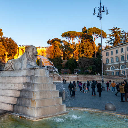 Rome Italy. Detail of one of the four Fountains of the Lions in Piazza del Popolo, placed on the four sides of the Flaminio Obelisk, made of Egyptian-style travertine marble.の写真素材