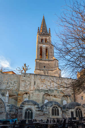 St. Emilion in Aquitaine, France. View of the monolithic church and bell tower, carved out of the limestone rock from the 12th century, symbol of the enchanting medieval village famous for its fine wines.の写真素材