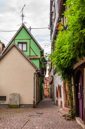 Riquewihr in Alsace, France. Enchanting medieval village, along the Strada dei Vini that connects Colmar to Strasbourg. View of the old village within the walls.の写真素材