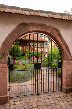 Riquewihr in Alsace, France. Enchanting medieval village, along the Strada dei Vini that connects Colmar to Strasbourg. View of the old village within the walls.のeditorial素材