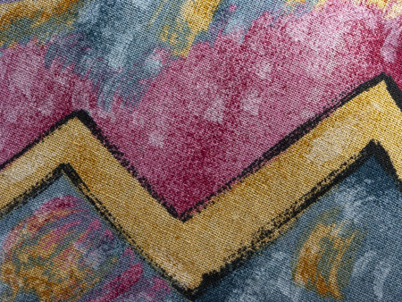 Detail of cotton fabric produced in Italy, multicolored with lines, strokes and curves. A typical...