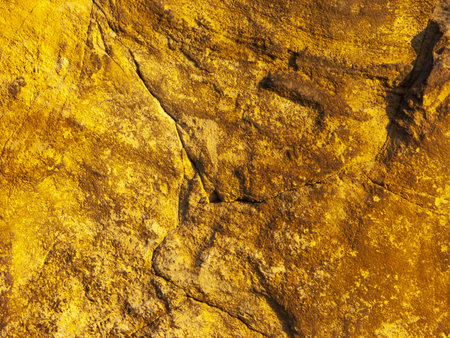 Typical detail of an ancient Italian house wall, made of hand-carved river stones. Wall with which...