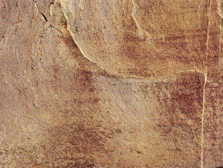 Typical detail of an ancient Italian house wall, made of hand-carved river stones. Wall with which...