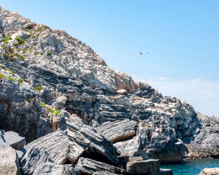 Portovenere, Italy. Beautiful seaside village with the famous gulf of poets that inspired the poems of Byron, a popular tourist destination for beach holidays and tracking in unspoiled nature. Gulf of poets.の写真素材