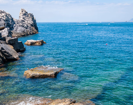 Portovenere, Italy. Beautiful seaside village with the famous gulf of poets that inspired the poems of Byron, a popular tourist destination for beach holidays and tracking in unspoiled nature. Gulf of poets.の写真素材