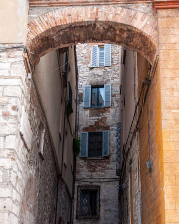 Todi in Umbria, Italy. View of the ancient village full of medieval buildings. It rises on the hills since the Etruscan times and overlooks the valley of the Tiber river.の写真素材