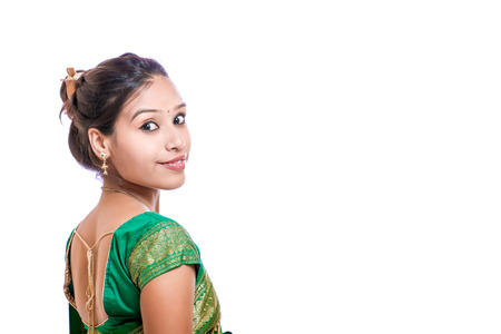 Happy young beautiful traditional Indian woman in traditional sareeの写真素材