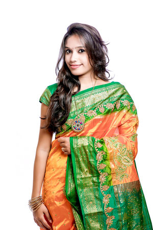 Happy young beautiful traditional Indian woman in traditional sareeの写真素材