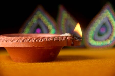 Rangoli design around Diwali lampの写真素材