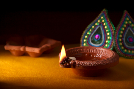 Rangoli design around Diwali lampの写真素材