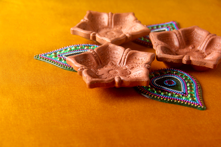 Rangoli design around Diwali lampの写真素材