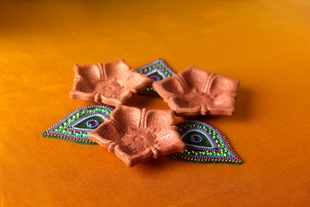 Rangoli design around Diwali lampの写真素材