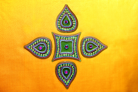Rangoli design around Diwali lampの写真素材