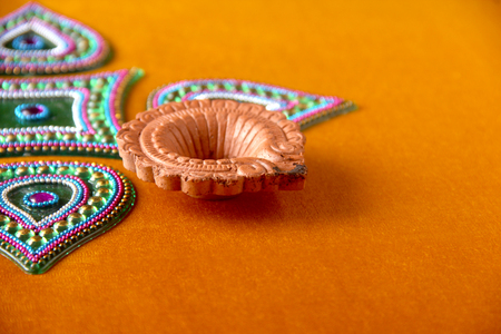 Rangoli design around Diwali lampの写真素材