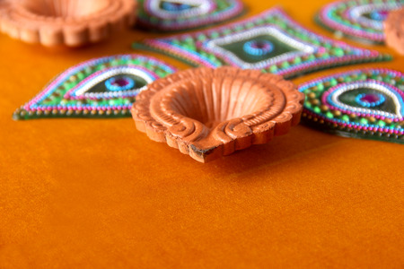 Rangoli design around Diwali lampの写真素材