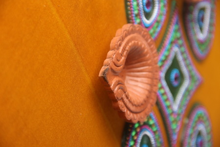 Rangoli design around Diwali lampの写真素材