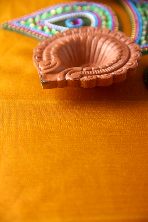Rangoli design around Diwali lampの写真素材