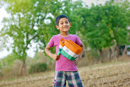 Indian Flag in child handの写真素材
