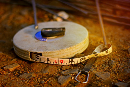 measure tape on groundの写真素材