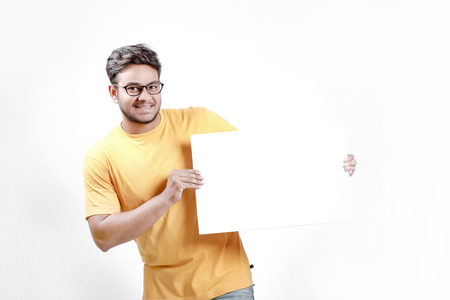 young indian model holding blank posterの写真素材