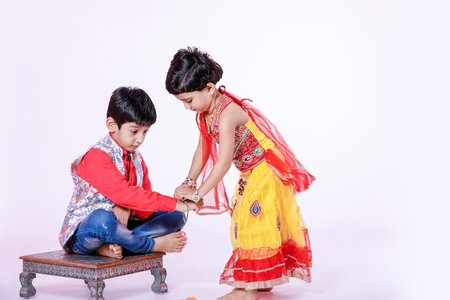 cute Indian child brother and sister celebrating raksha bandhan festivalの写真素材