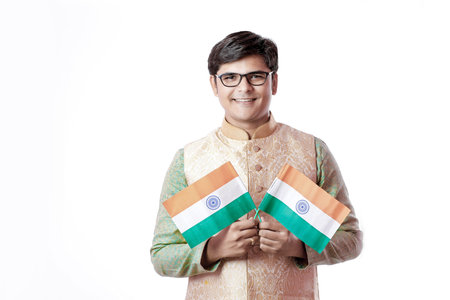 young Indian man holding Indian flag
