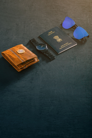travel concept , Indian passport with watch , wallet , sun glass and indian coinの写真素材