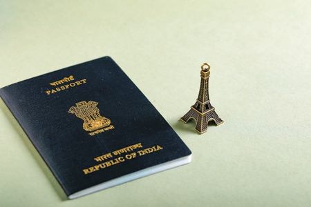 travel concept , Indian passport with Eiffel tower miniatureの写真素材