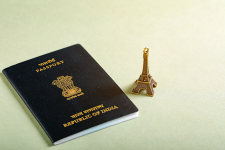 travel concept , Indian passport with Eiffel tower miniatureの写真素材