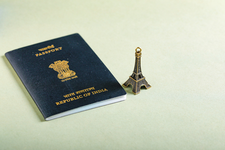 travel concept , Indian passport with Eiffel tower miniatureの写真素材