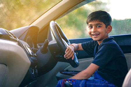 Cute Indian child in car