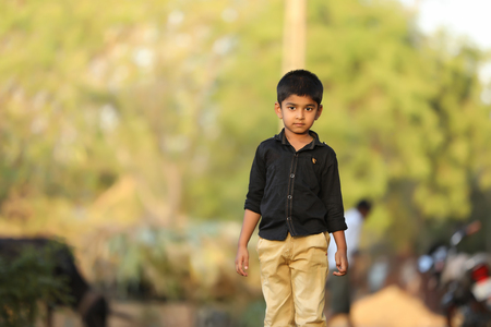 Cute Indian child with multiple expressionの写真素材