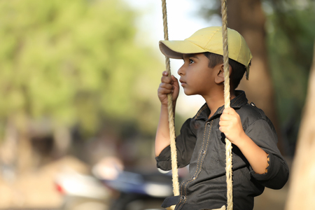 Cute Indian child wear capの写真素材