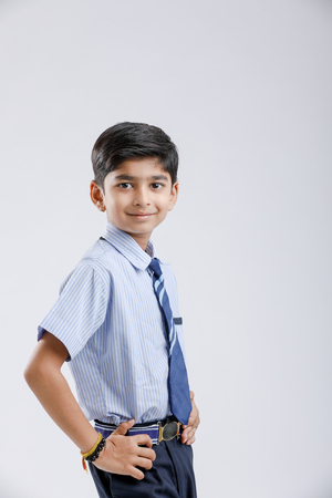 Cute little indian Indian / Asian school boy wearing uniformの写真素材