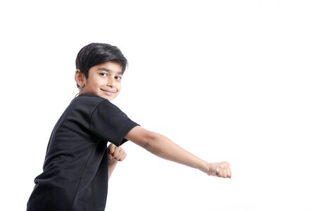 Cute Indian little boy playing , running and giving multiple expressionの写真素材