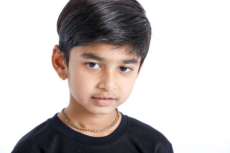 little Indian / Asian boy showing thumbs up