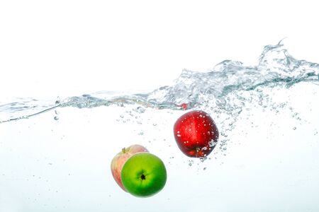 Falling Apple Into Clean Waterの写真素材