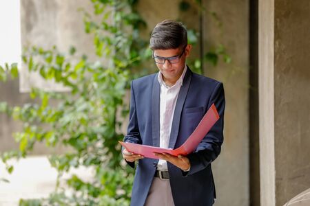 Indian businessman checking the documentsの写真素材