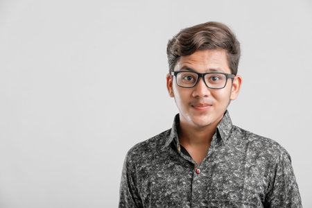 Portrait of Young Indian / Asian man  wearing spectacles