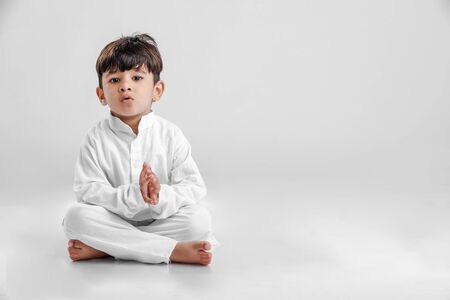 Indian little boy in Traditional Wear and Showing multi pal expressionの写真素材