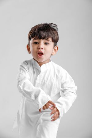 Indian little boy in Traditional Wear and Showing multi pal expressionの写真素材