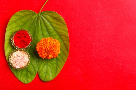 Happy Dussehra greeting card , green leaf and riceの写真素材