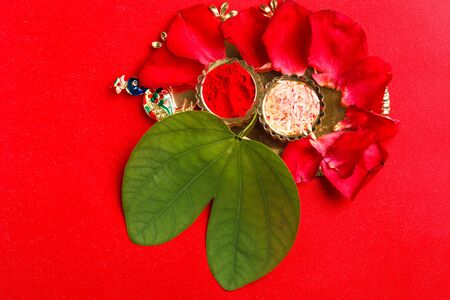 Happy Dussehra greeting card , green leaf and riceの写真素材