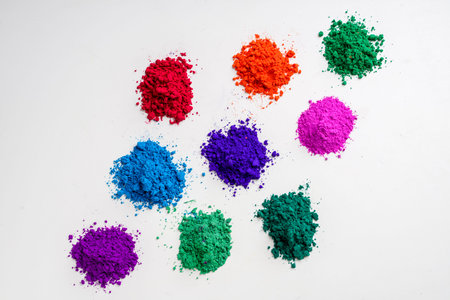 Indian Festival Holi, Multi color's cup on dark background