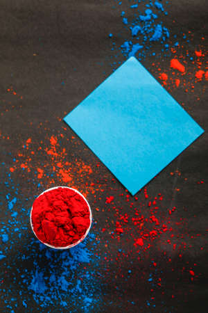 Indian Festival Holi, Multi color's cup on dark backgroundの写真素材