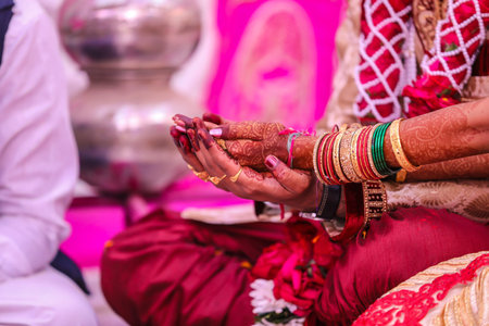 Indian Traditional Wedding: Groom and bride hand