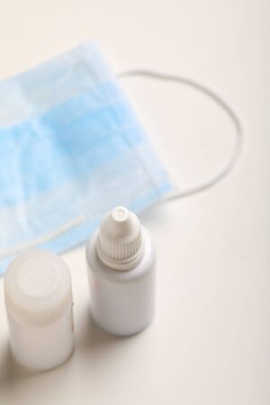 Medical mask and tablets for Corona protectionの写真素材